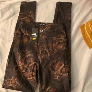 Shiny snake print jeggings
